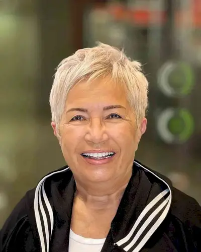 Choppy Piecey Pixie Cut with Blonde Tones for 60-Year-Olds