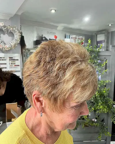 Fluffy Short Choppy Pixie Crop with Side Fringe and Golden Blonde Color for Women over 60