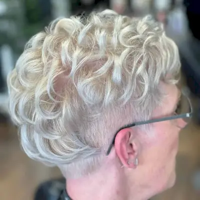 Wavy Pixie Cut for Older Women with Glasses