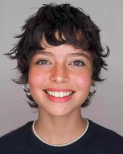 Tousled Razor Cut Wavy Pixie with Bangs