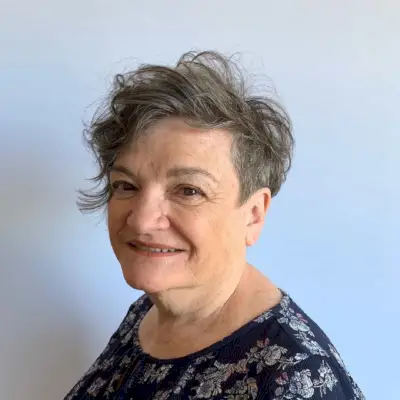 Grey asymmetrical pixie for women over 60
