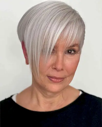 Asymmetric Pixie with Long Side Bangs for ladies in their 50s with straight fine hair