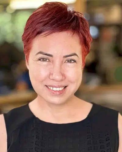 Dark Red Pixie with Swept-Over Fringe for Round Faces 