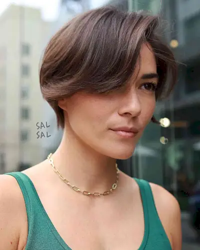 Brunette Wixie Cut with Layers and side bangs