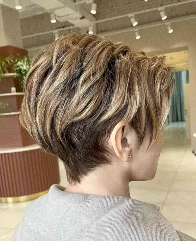 Light Brown Highlights on a Long Pixie with Layers