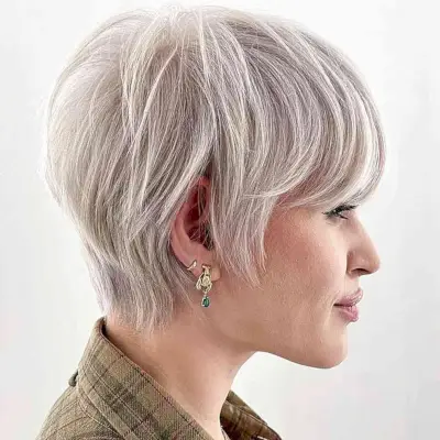 Short Platinum-Toned Layered Long Pixie for women with an edgy style