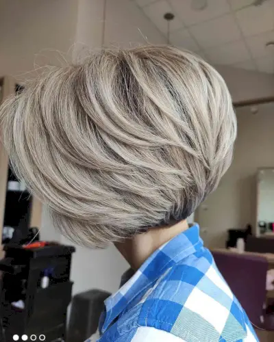 Layered Blonde Pixie Bob with Dark Roots
