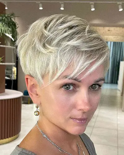 Champagne Blonde Pixie with Layers and bangs