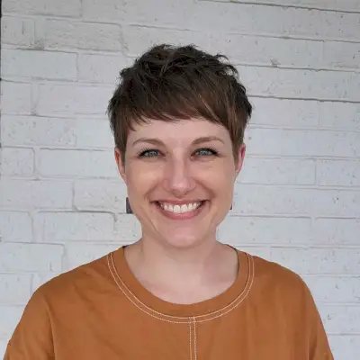 Subtle Brunette Pixie cut and color