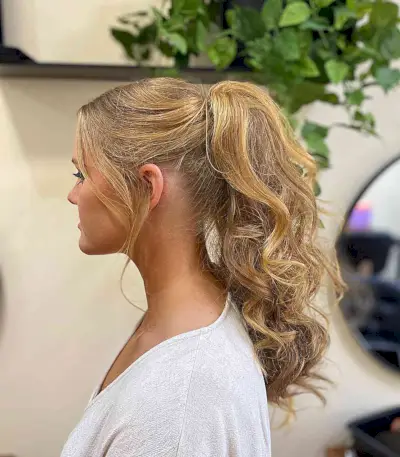 Golden Blonde Curly Updo Ponytail with Messy Waves