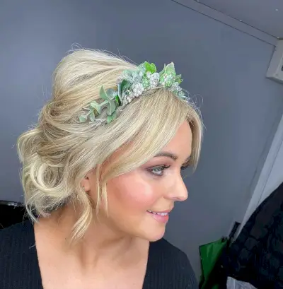 Low Messy Bouffant with Face-Framing Bangs