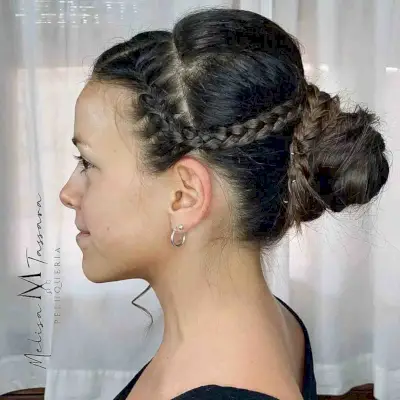 Mid-Length French Braid with a Twisted Bun for Prom Night