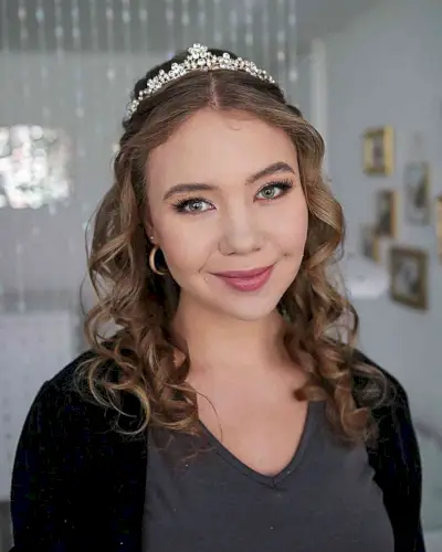 Curled Middle-Parted Hair with a Tiara Down Hairdo for Prom