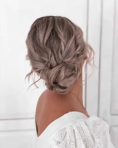 Wavy Low Bun with Twists