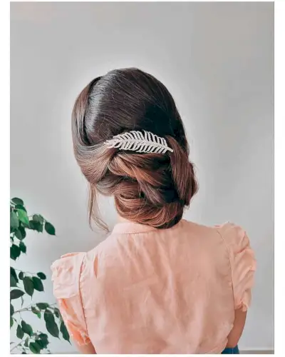 Bun with Twists and Feather Hair Clip