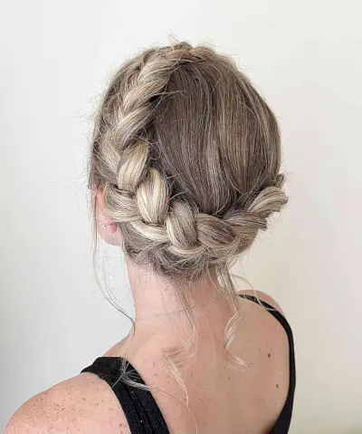 Updo Braided Crown with Loose Wavy Strands for Long Hair