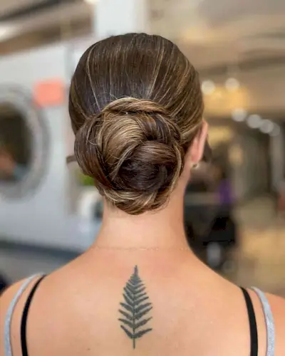 Sleek Low Bun for Long Straight Hair on Prom Night