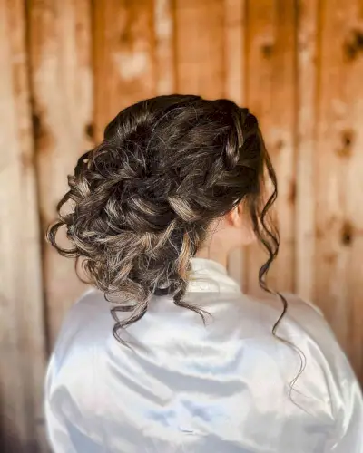 Bohemian Prom Updo with Loose Curls on Long Brown Tresses
