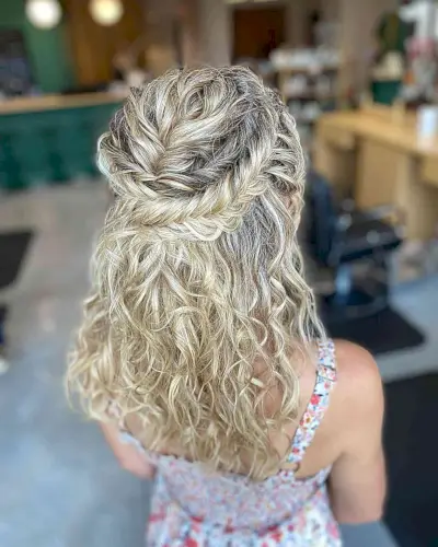 Curly Half-Updo with a Wrapped Braid and mid-length hair for prom