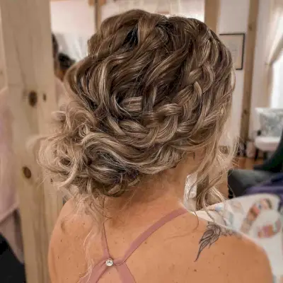 Textured Messy Updo for Curly Prom Hair