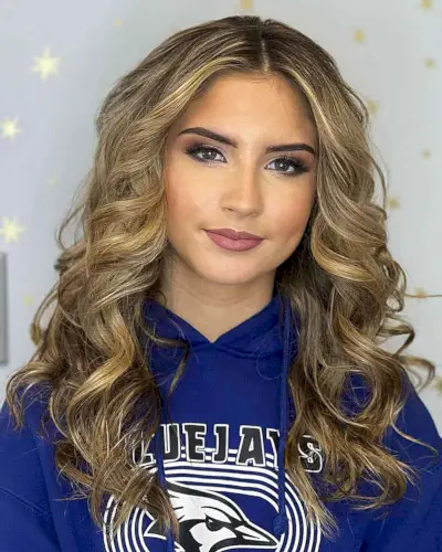 Center-Parted Medium Curled Hairstyle for Prom Queens