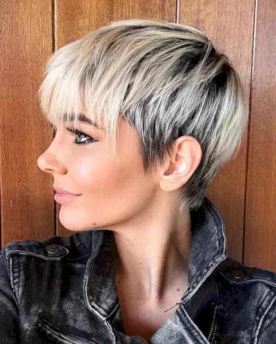 Short Bleach Blonde Shaggy Pixie with Black Roots for women in their 30s