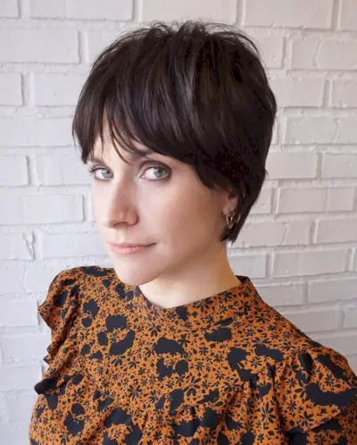 shaggy pixie cut with long bangs