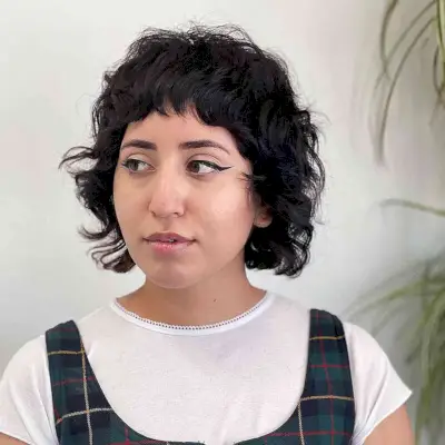 Short curly shag cut with layers