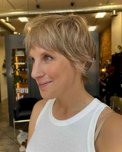 Short Sun-Kissed Blonde Wixie Hair with Bangs for Oval Faces