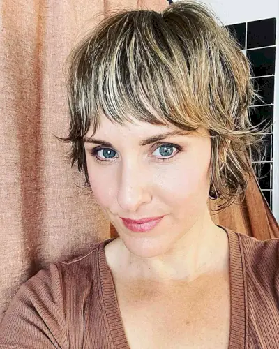 Cute Wixie Cut with Blonde Highlights