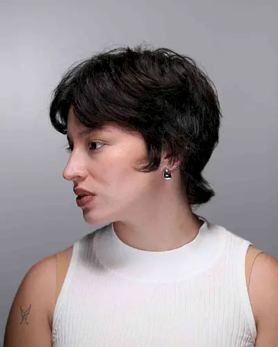 Textured Winged Pixie with Curtain Bangs for Thick Hair