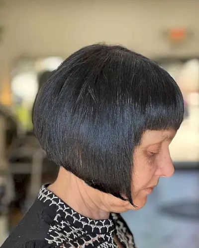 Jaw-Lengthj Face-Framing Bob with Short Bangs on Older Ladies Over 60 with Black Hair