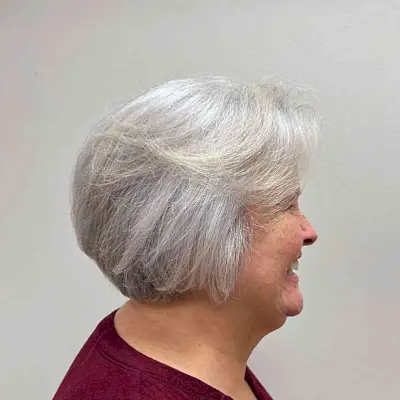 Short Jaw-Length Bobbed Hair with Swoopy Layers for Older Women Over 60 with White Hair