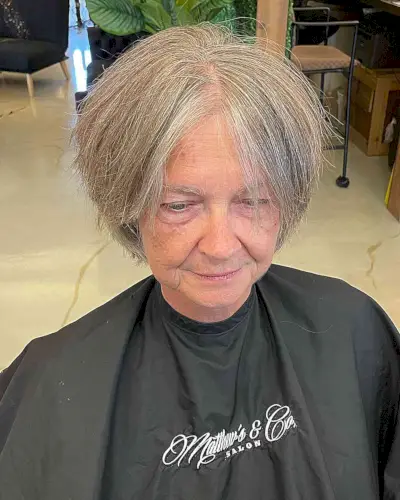 Jaw-Length Grey Pixie with Long Side Bangs for Women Aged 60