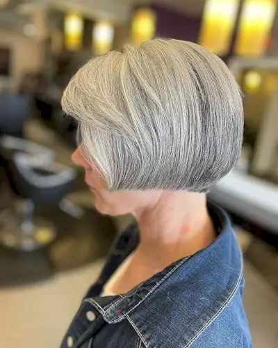 Edgy Short Jaw-Length Bob with Straight Edges and Side Bangs for Older Women Over Sixty
