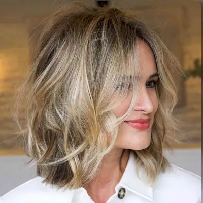 Messy Tousled Short Bob Haircut with Blonde Balayage for girls with straight hair