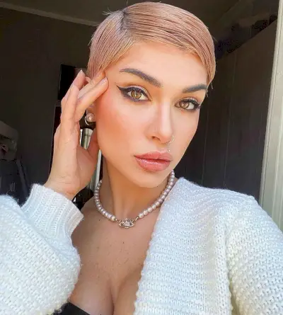 Sleek Pixie Hairstyle with a Side Part