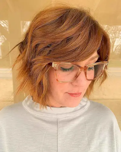 Long Side-Swept Fringe on a Razored Bob