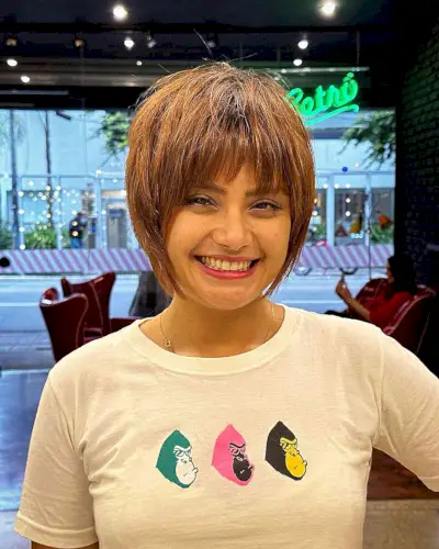 Golden Brown Chin-Length Bob with Choppy Fringe and Face-Framing Layers