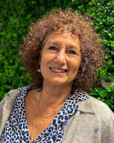 Shoulder-Length Curls and Bangs for Women Over 60