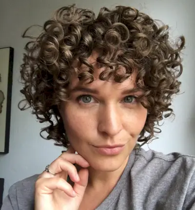 Fantastic Brunette Curly Bob with Bangs