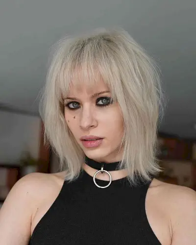 Above-the-Shoulder Bright Blonde Shaggy Lob for women with thin hair