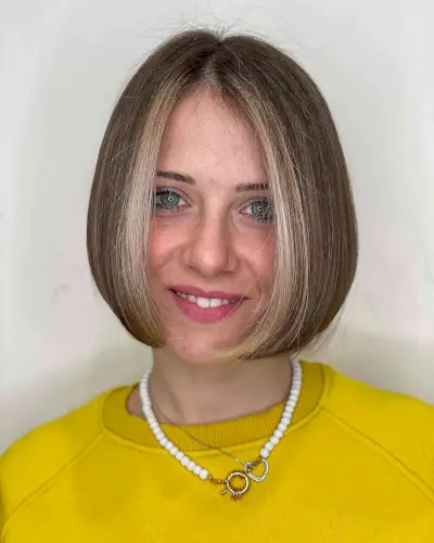 Classic Above the Shoulders Bob with a Money Piece on Straight Hair