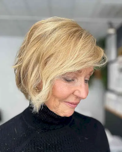 Chin-Length Golden Blonde Hair with Textured Choppy Bob Cut and Side Bangs