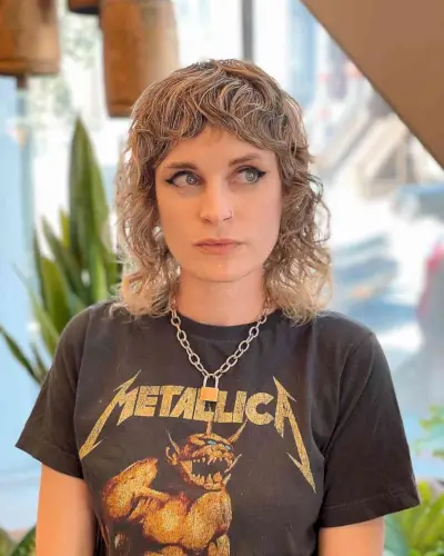 Short Shaggy Effortless Loose Curls with Bangs