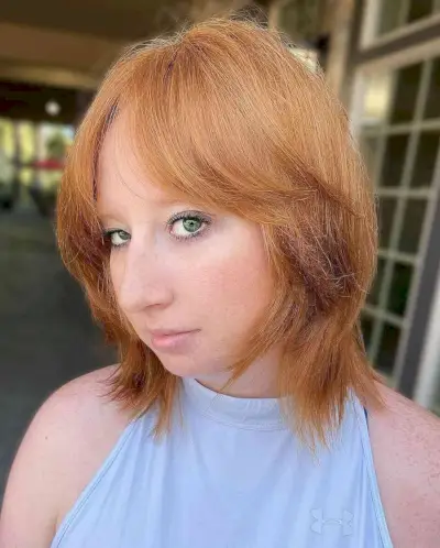 Layered Shag with Curtain Bangs for Short Straight Hair