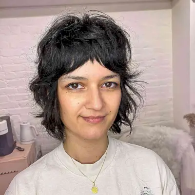 Short 70s Razored Bob Cut with Shaggy Bangs