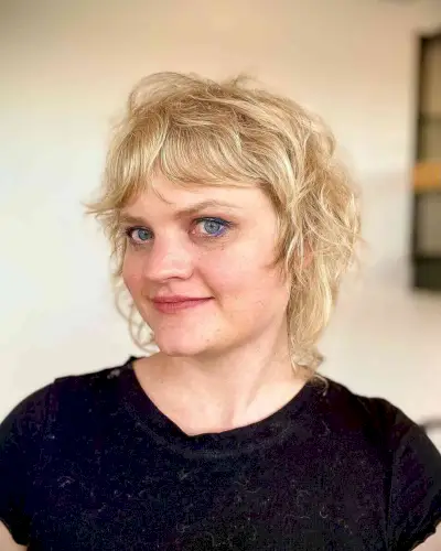 Short Tousled Shag with Wispy Layers and Bangs for Thin Hair