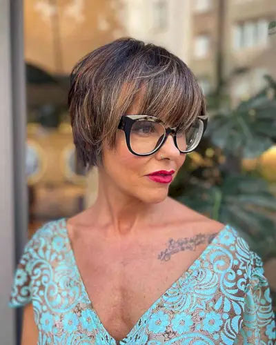Chic Short Shag for Women with Bangs and Glasses