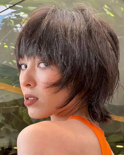 Short Heavily Textured Shag with Bangs for Finer Hair and women with an edgy style